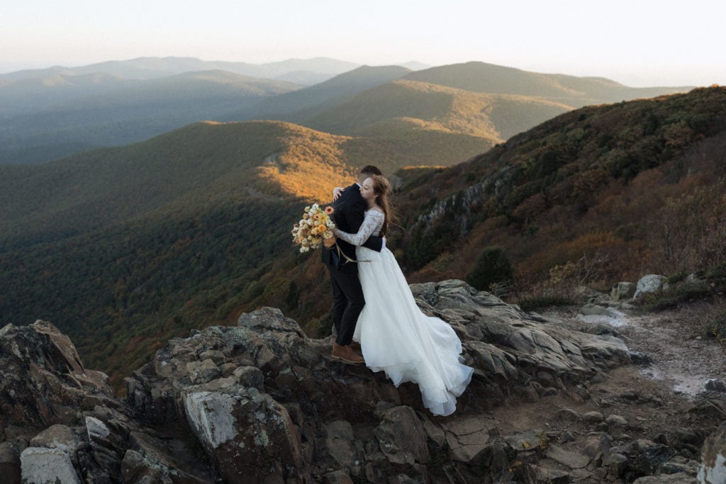 virginia elopement photographer took photo of couple in the virginia mountains in their wedding attire